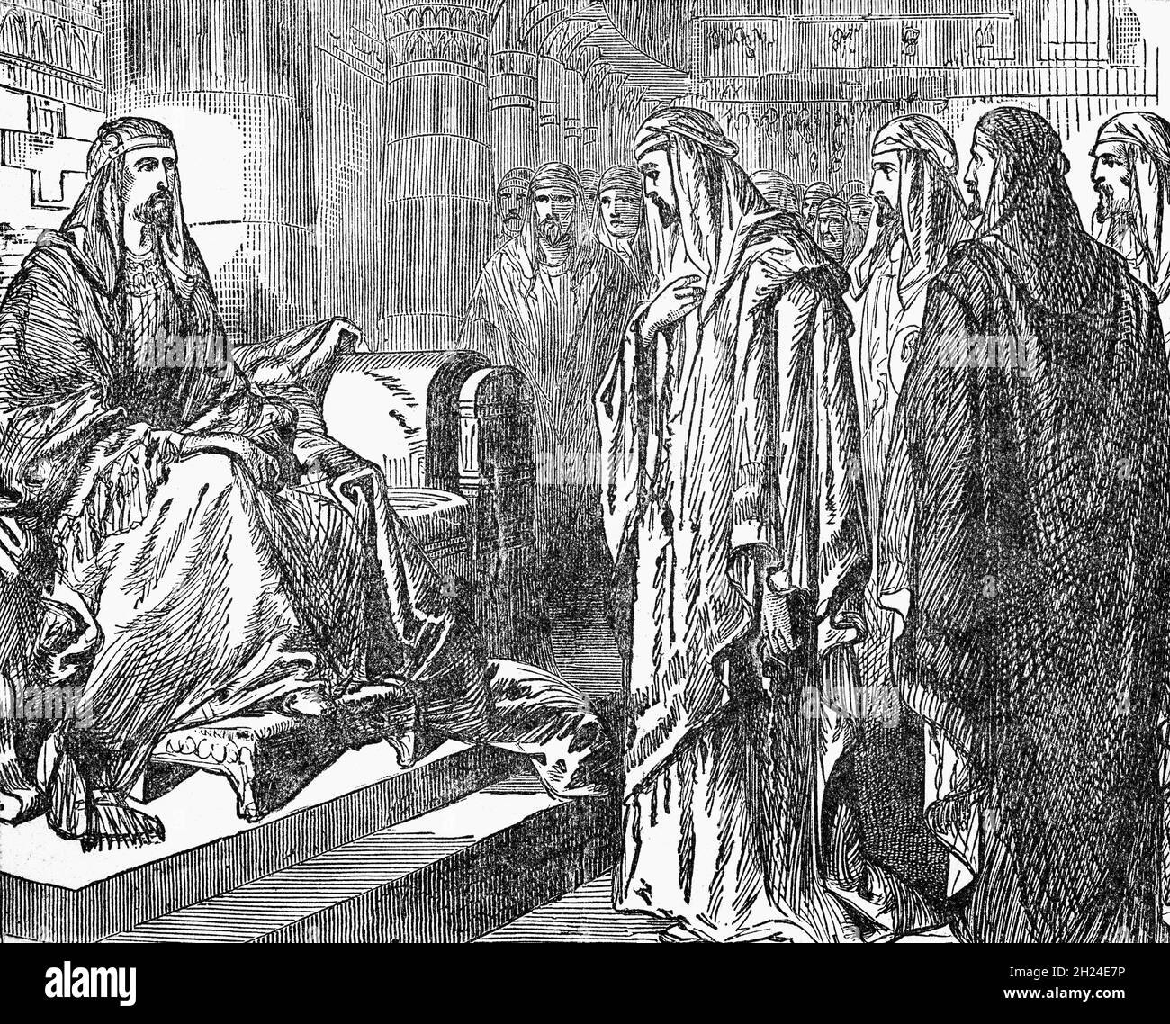 Un'illustrazione del tardo XIX secolo dal Libro di Daniele di Daniele interpretando il sogno di re Nebuchadnetsar che regnò dal 605 al 562 a.C. conquistò Gerusalemme e deportò gli ebrei. Originariamente il re chiedeva ai suoi magi di interpretare il sogno, ma rifiutava di descriverlo, di conseguenza i saggi non erano in grado di farlo, e Daniele apparve uno di quelli deportati da Israele e che garantiva un’educazione nel palazzo del re. Chiese al re un po' di tempo per scoprire il sogno, pregò tutta la notte finché Dio gli rivelò il sogno, e andò dal re e interpretò il sogno. Foto Stock