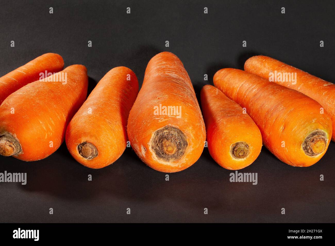 gruppo carota su sfondo nero Foto Stock