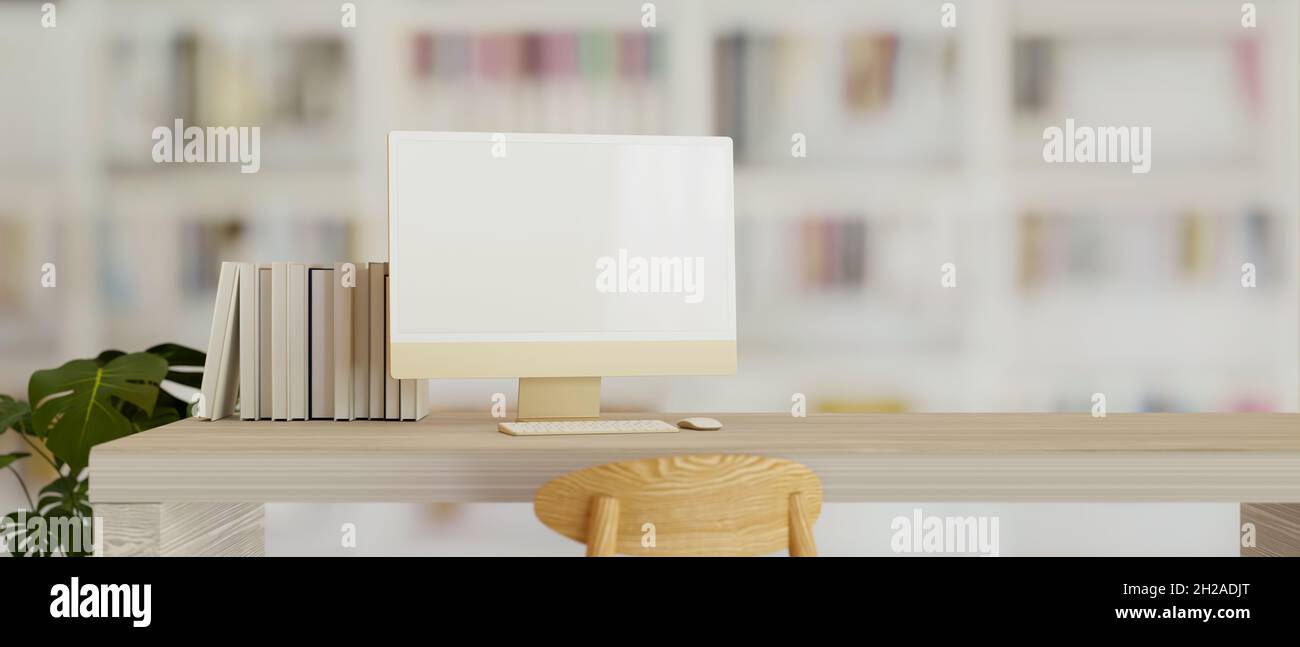 Moderno spazio di home Office contemporaneo con computer mockup su scrivania  di legno chiaro su libreria di scaffali di libri sfocati sullo sfondo.  rendering 3d, 3d illu Foto stock - Alamy