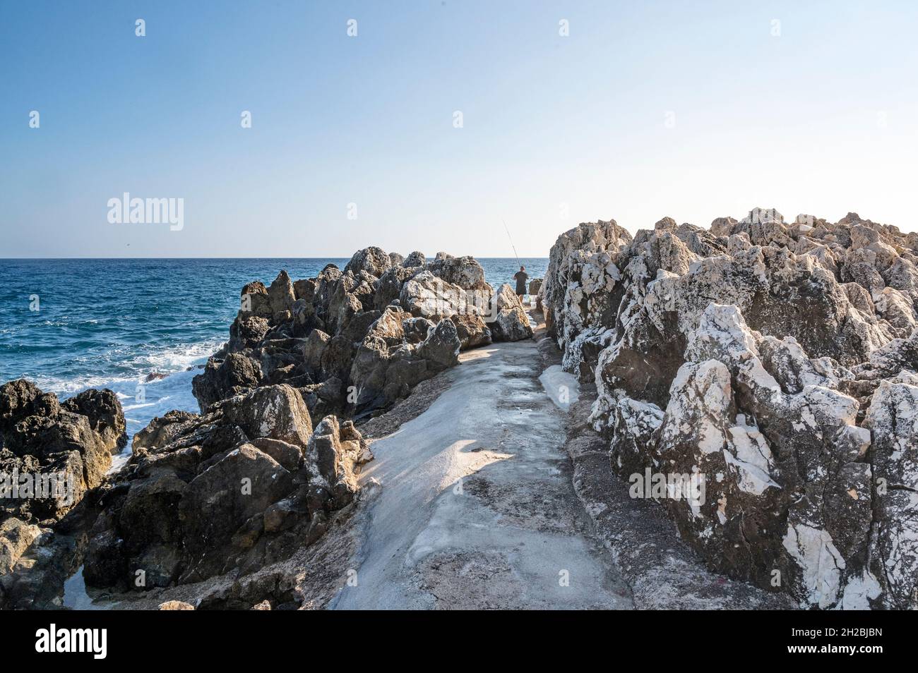 Pescatore a Cap Martin, Costa Azzurra Foto Stock