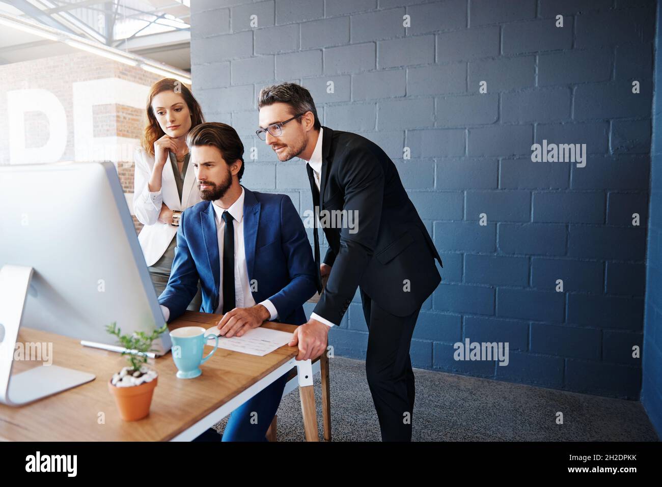 Il lavoro di squadra consente loro di ottenere risultati superiori Foto Stock