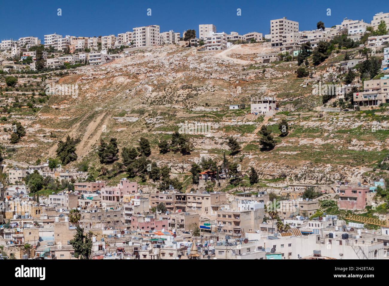 Case su un pendio a Salt Town, Giordania Foto Stock