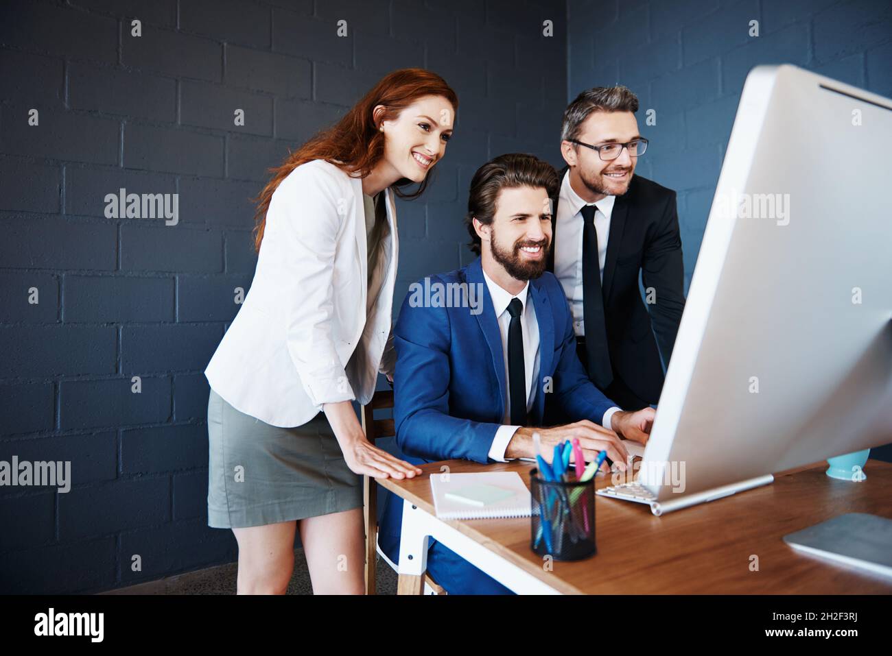 Il lavoro di squadra è la competenza principale di ogni azienda Foto Stock