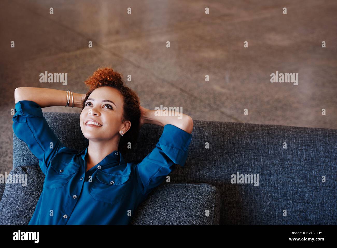 È fantastico raccogliere le ricompense del duro lavoro Foto Stock