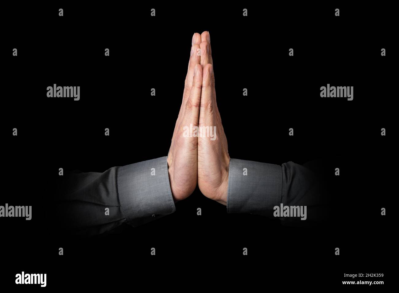 Le mani della preghiera cristiana pregano Gesù Dio. Fede religiosa Foto Stock