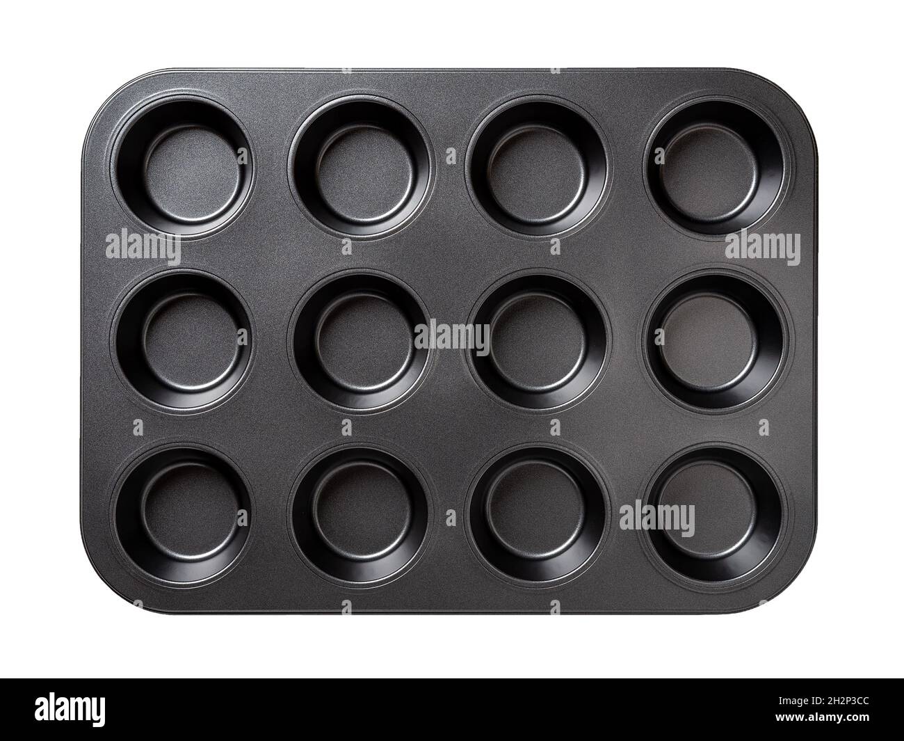 Teglia per muffin con rivestimento antiaderente isolato su fondo bianco. Vassoio da forno per muffin da 12 tazze, cupcake vuota per torte, torte e dolci Foto Stock