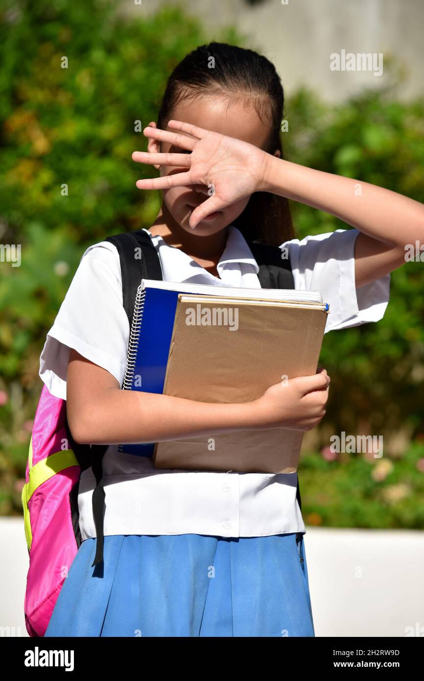Una ragazza studente e Bright Sun Foto Stock