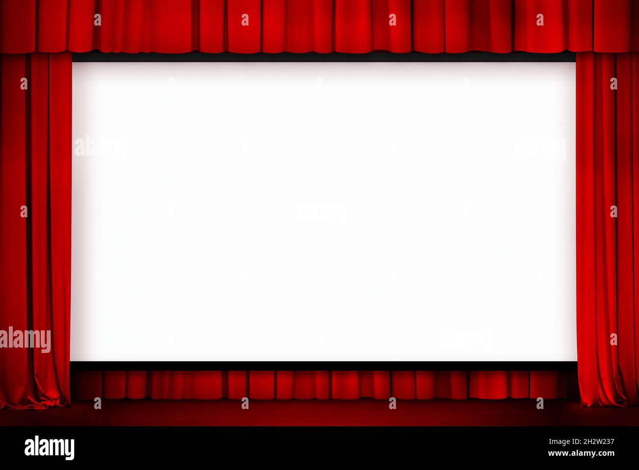 grande schermo cinematografico con tende rosse Foto Stock