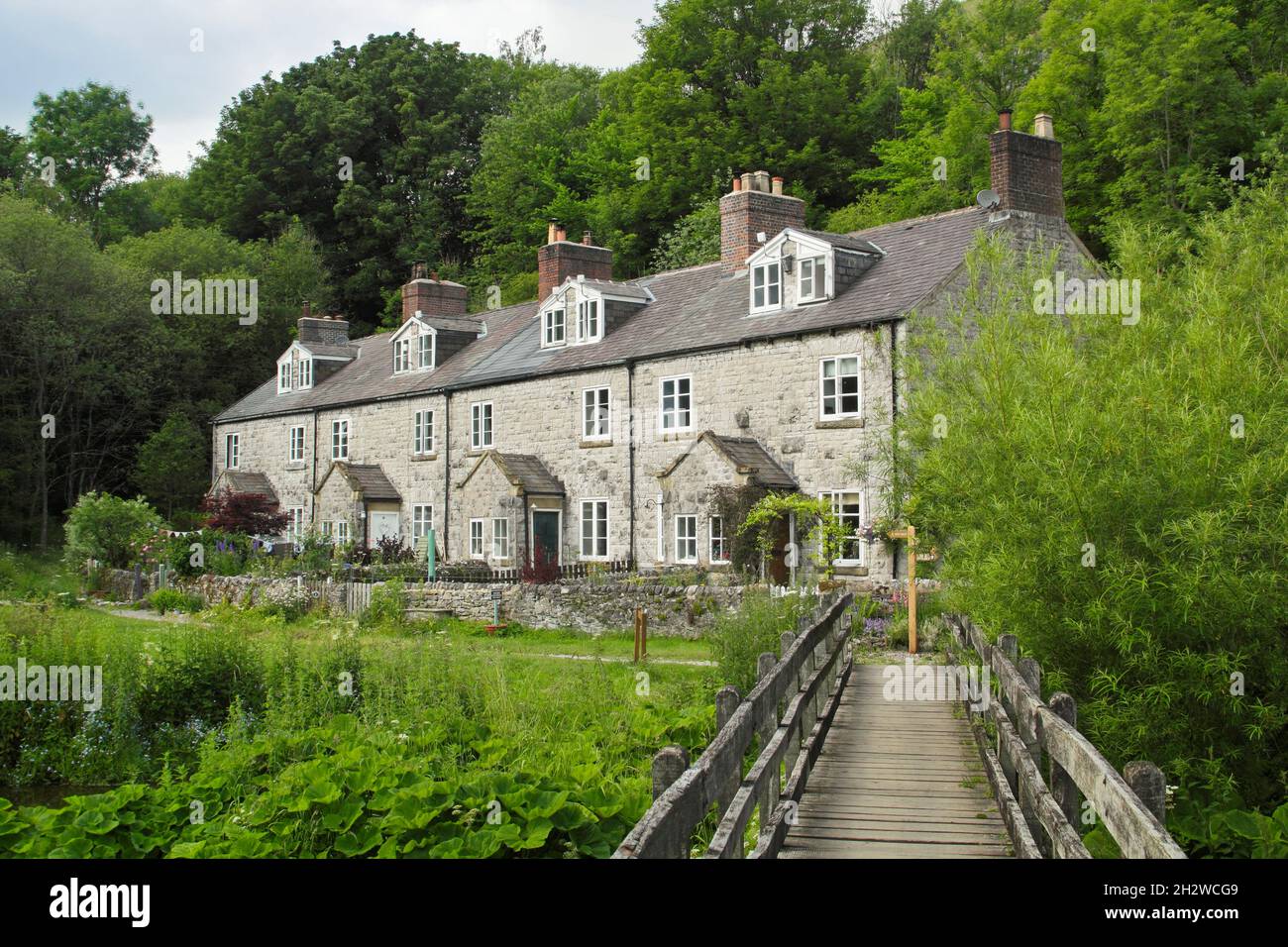 Blackwell Mill cottage sul fiume Wye, Upper Wye Valley vicino a Buxton, Peak District, Derbyshire, Inghilterra, Regno Unito. Foto Stock