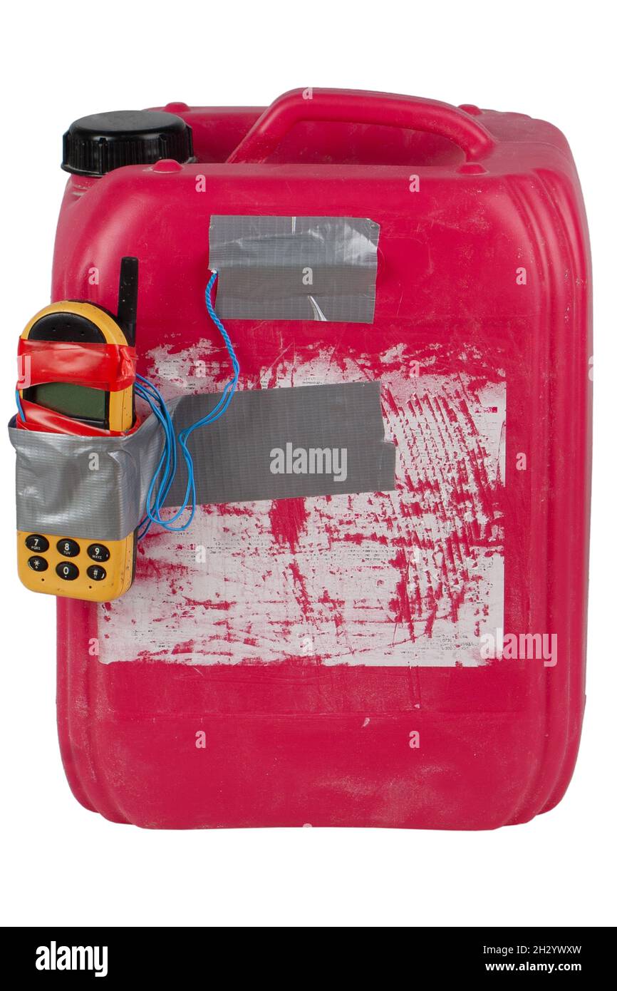 Caraffa chimica rossa bomba IED con fusibile cellulare. Foto Stock