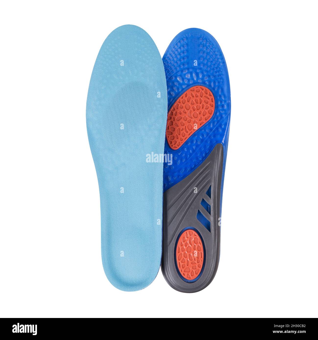 Solette ortopediche di colore blu isolate su sfondo bianco. Solette per una passeggiata confortevole e sana. Foto Stock