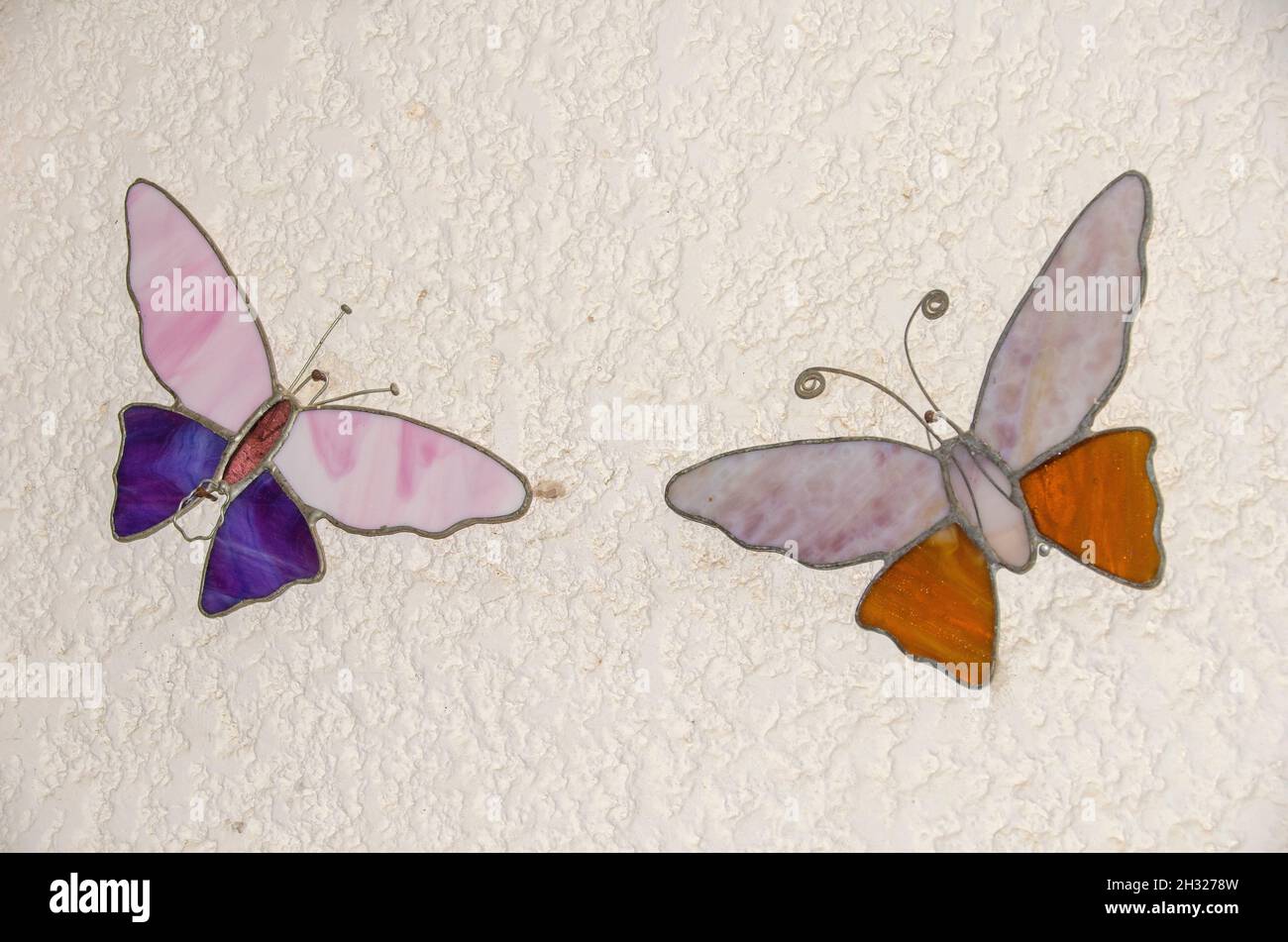 Figurina colorata di farfalla di vetro Foto Stock