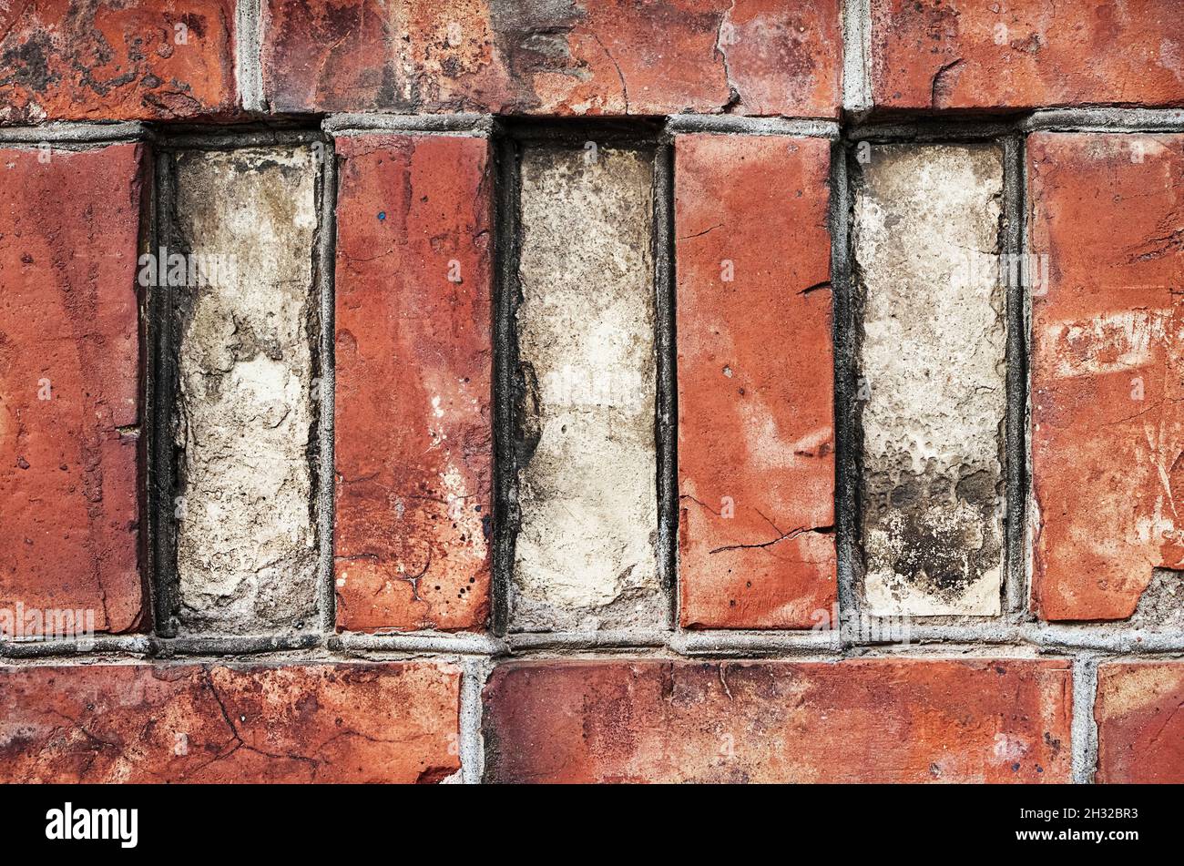 Primo piano di vecchio muro di mattoni rossi, grunge sfondo. Spazio di copia per il testo. Foto Stock