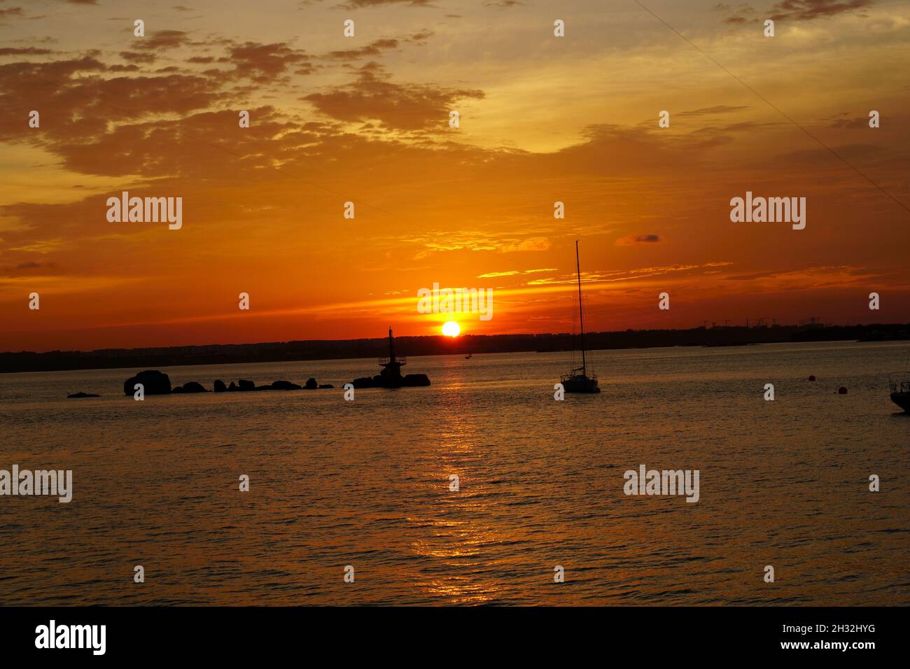 Tramonto sulla spiaggia di Changi Foto Stock