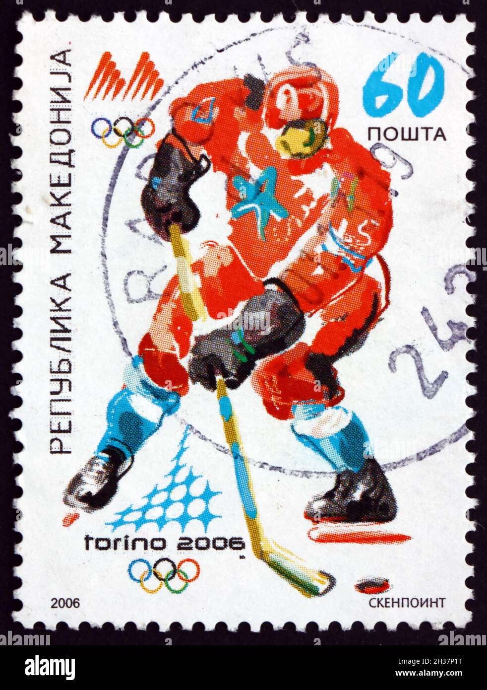 MACEDONIA - CIRCA 2006: Un francobollo stampato in Macedonia mostra hockey su ghiaccio, 2006 Olimpiadi invernali, Torino, circa 2006 Foto Stock