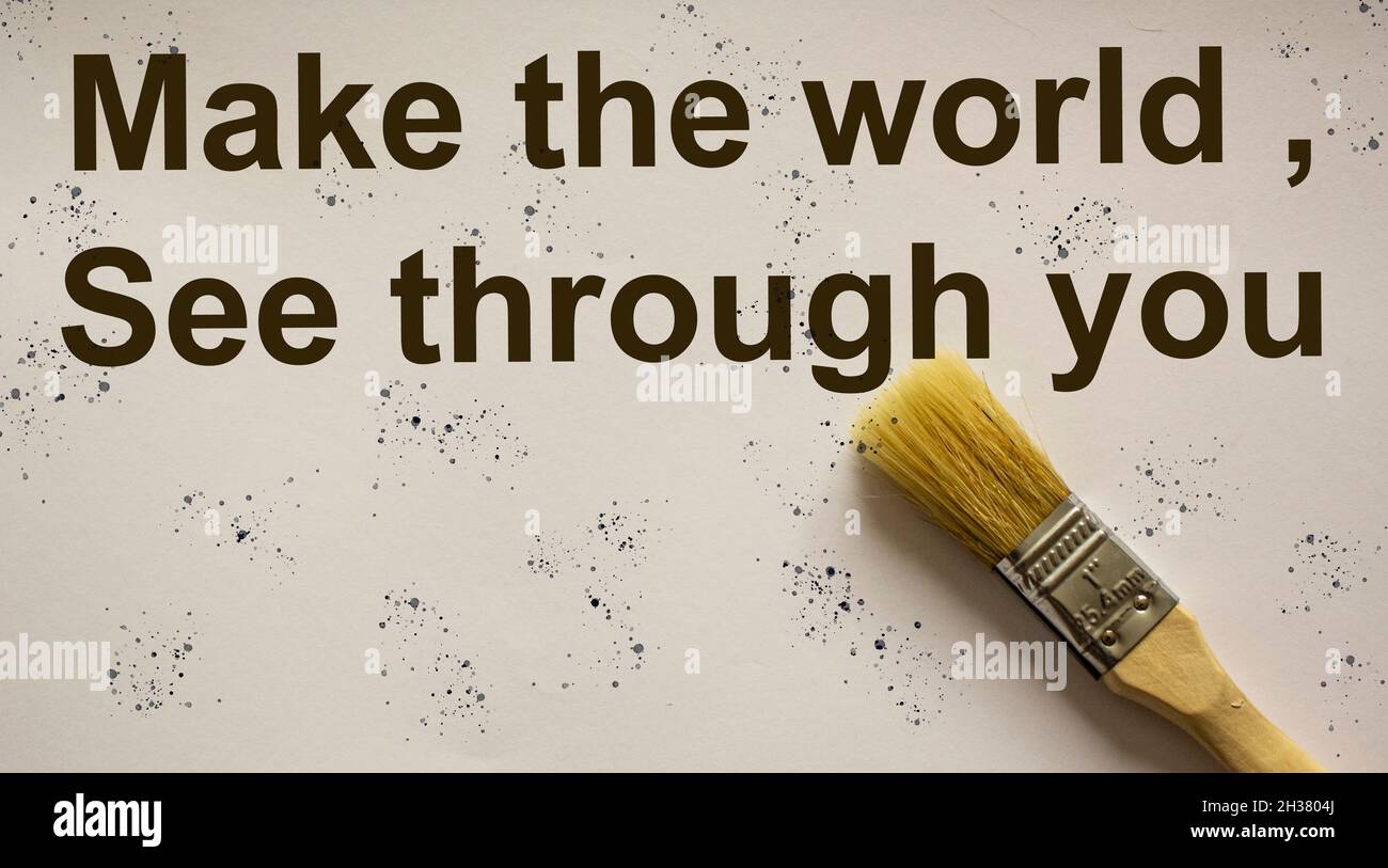 Su una foglia bianca con un pennello il testo fa vedere il mondo attraverso di voi Foto Stock
