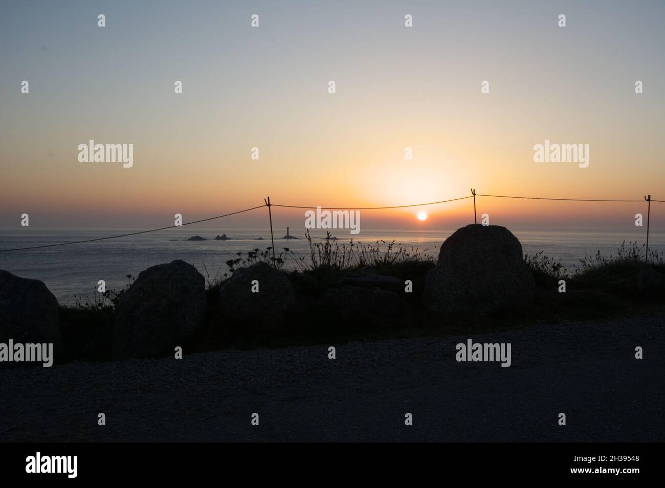 Tramonto a Lands End, Cornwall, Regno Unito Foto Stock