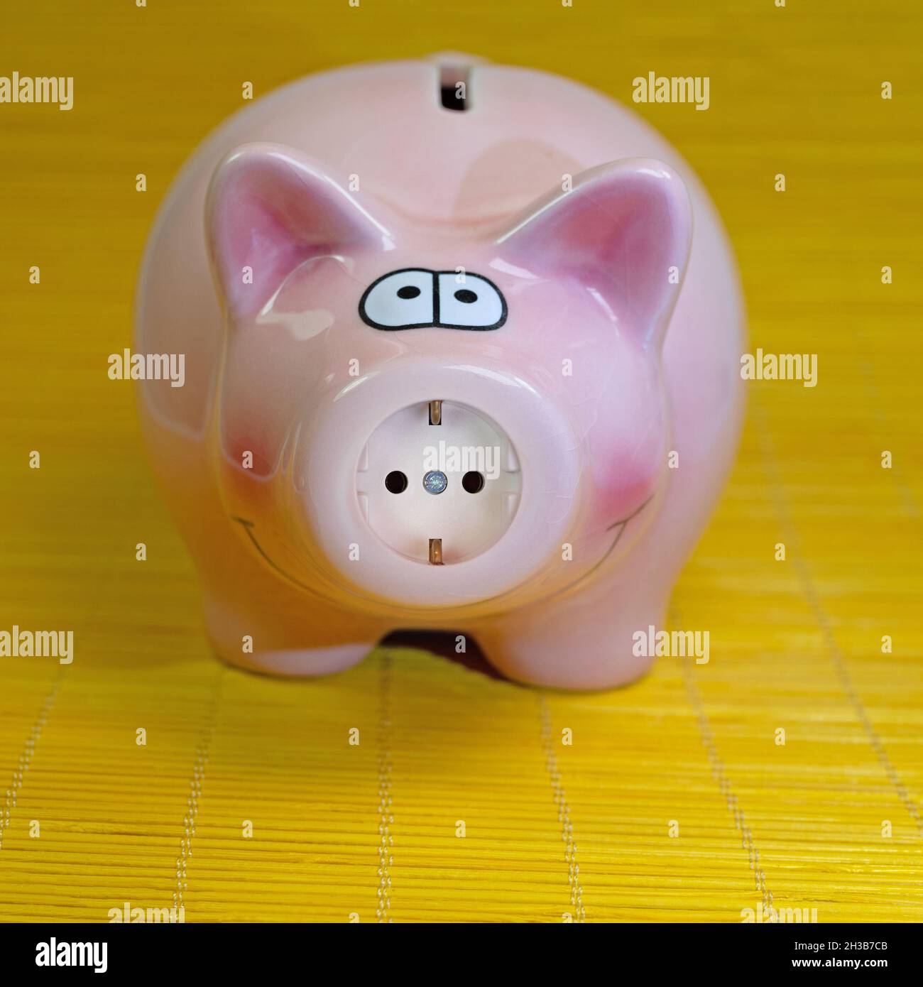 Piggy bank con presa Foto Stock
