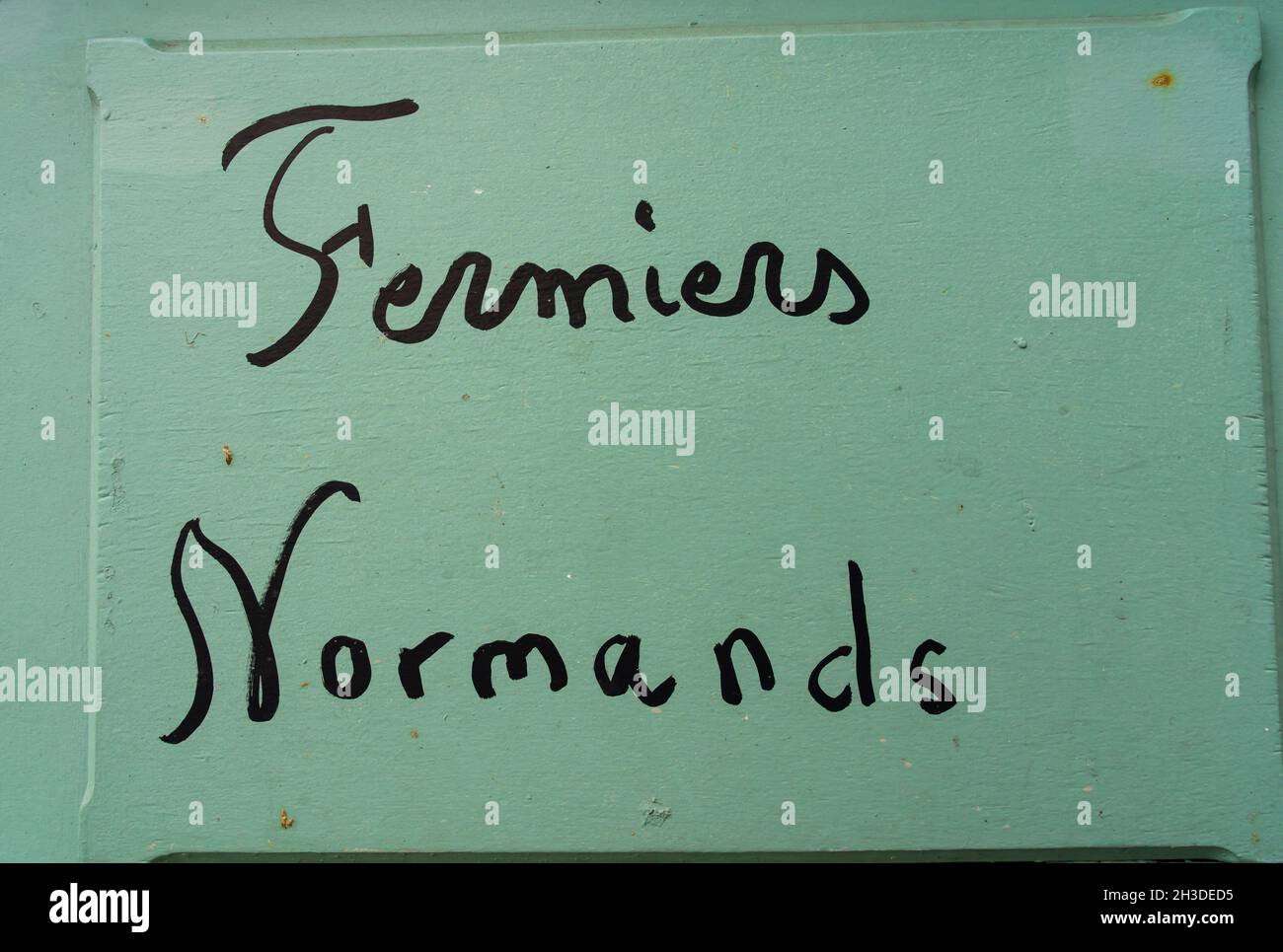 L'iscrizione Fermiers Normanni - agricoltori normanni - su sfondo verde Foto Stock