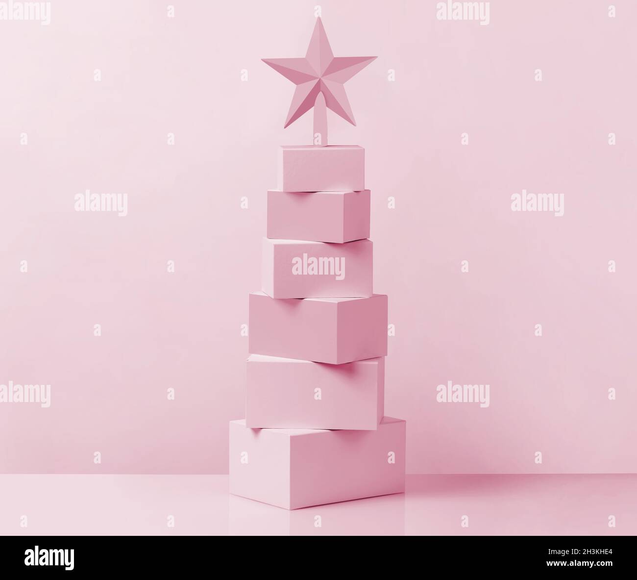 Albero di Natale fatto da scatole rosa Foto Stock