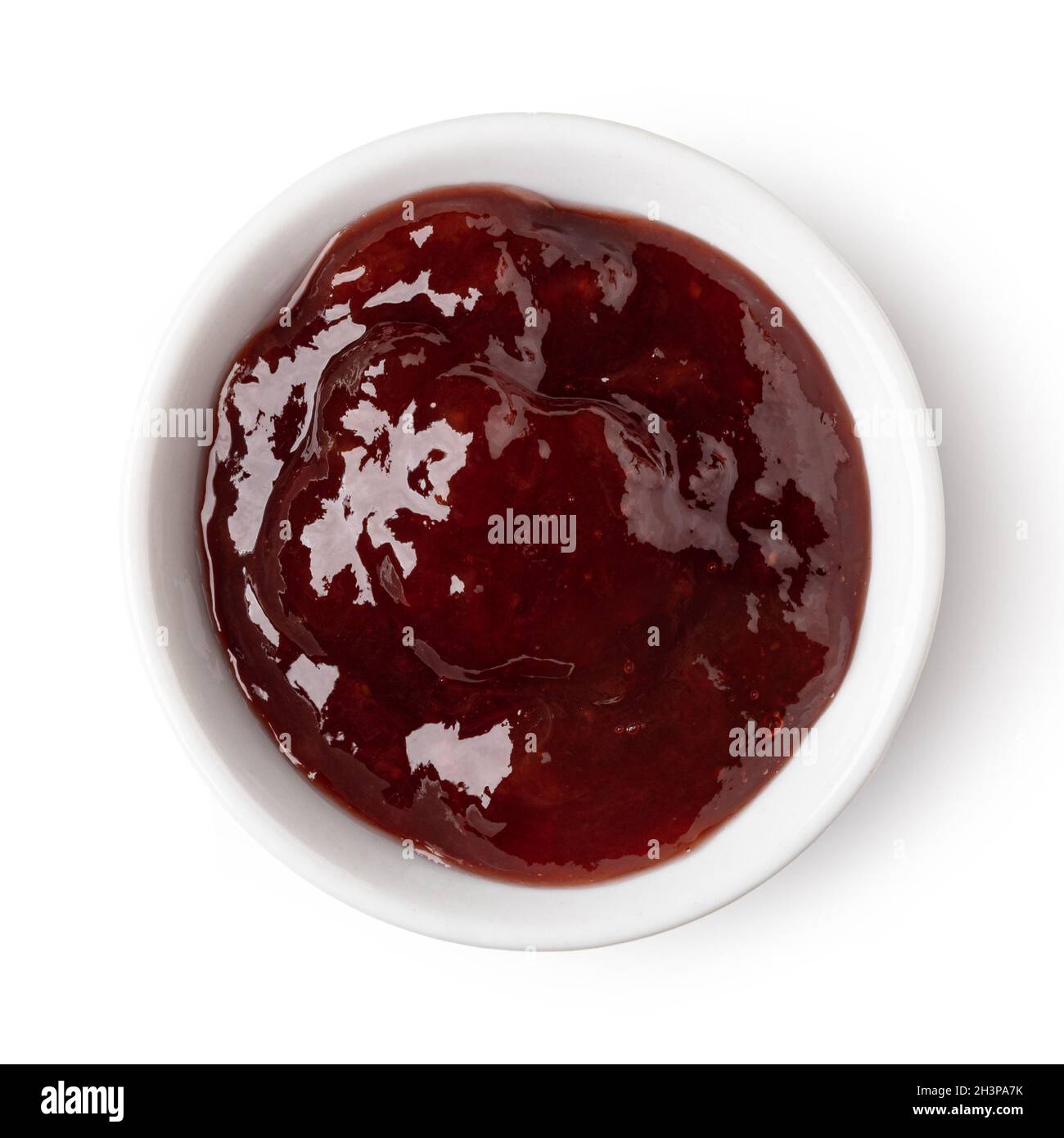 Recipiente di vetro con marmellata di bacche rosse Foto Stock