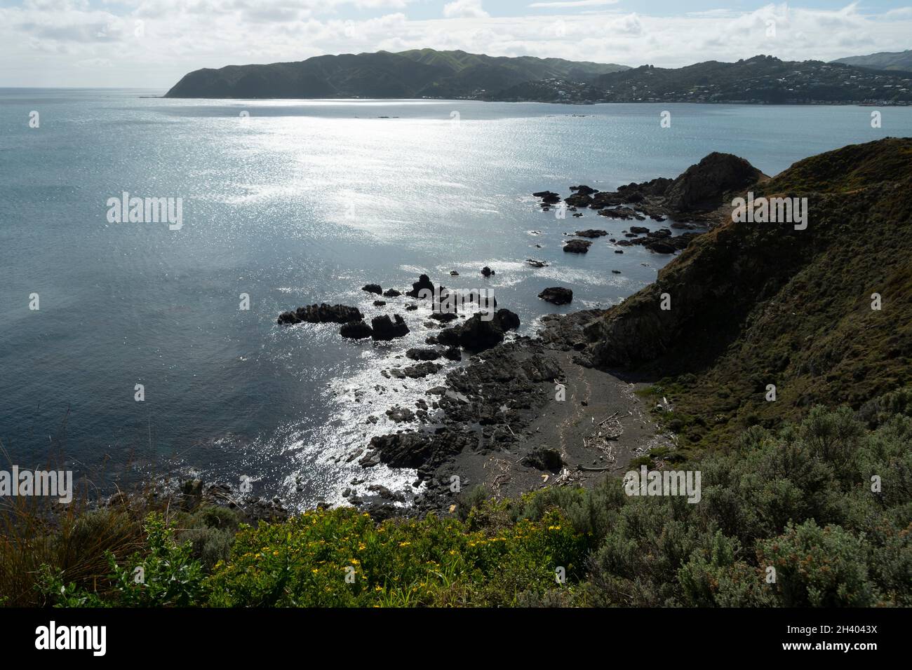 Il sole sul mare all'entrata del Porto di Porirua, Baia di Titahi, Porirua, Wellington, Isola del Nord, Nuova Zelanda Foto Stock