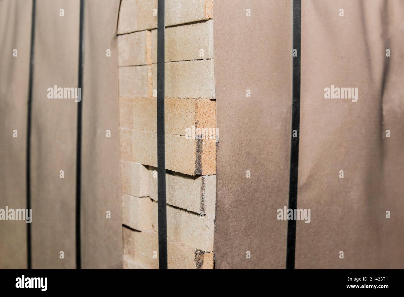 Un mazzo di mattoni refrattari, blocchi di mattoni ignifughi. Foto Stock