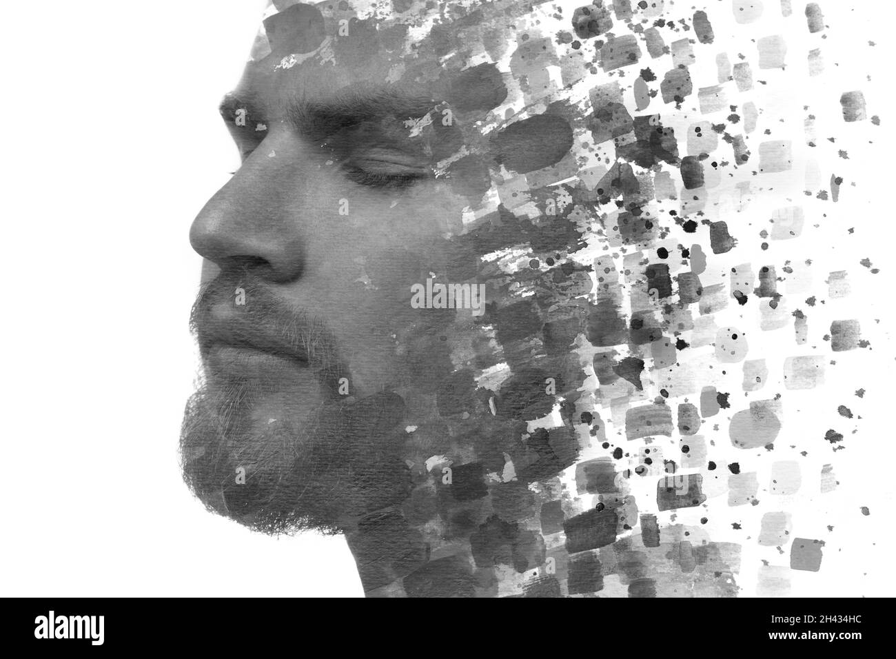Pittura. Un ritratto in bianco e nero di un giovane uomo bello combinato con schizzi di inchiostro nero. Foto Stock