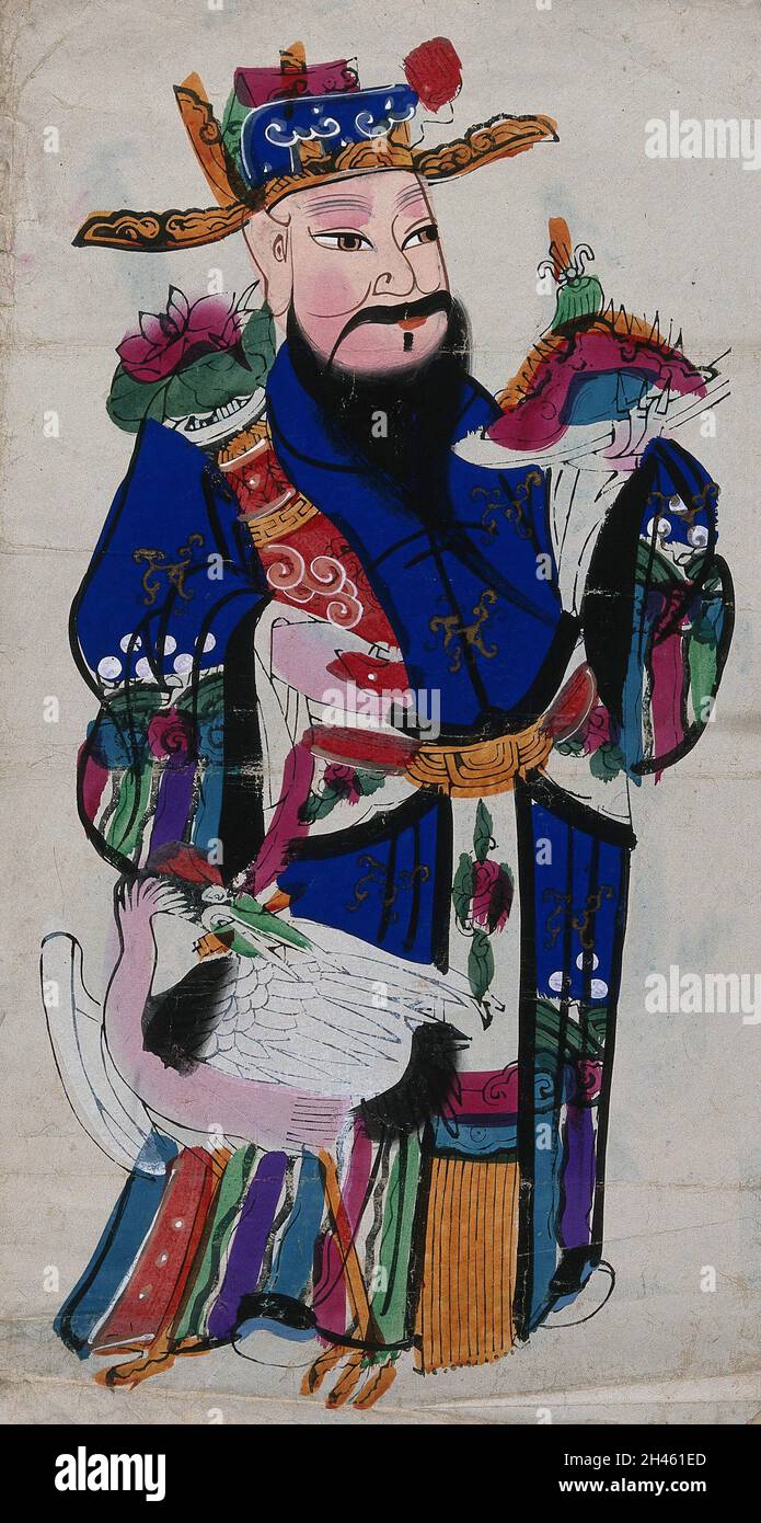 Uno studioso cinese con un airone. Legno colorato da un artista cinese. Foto Stock