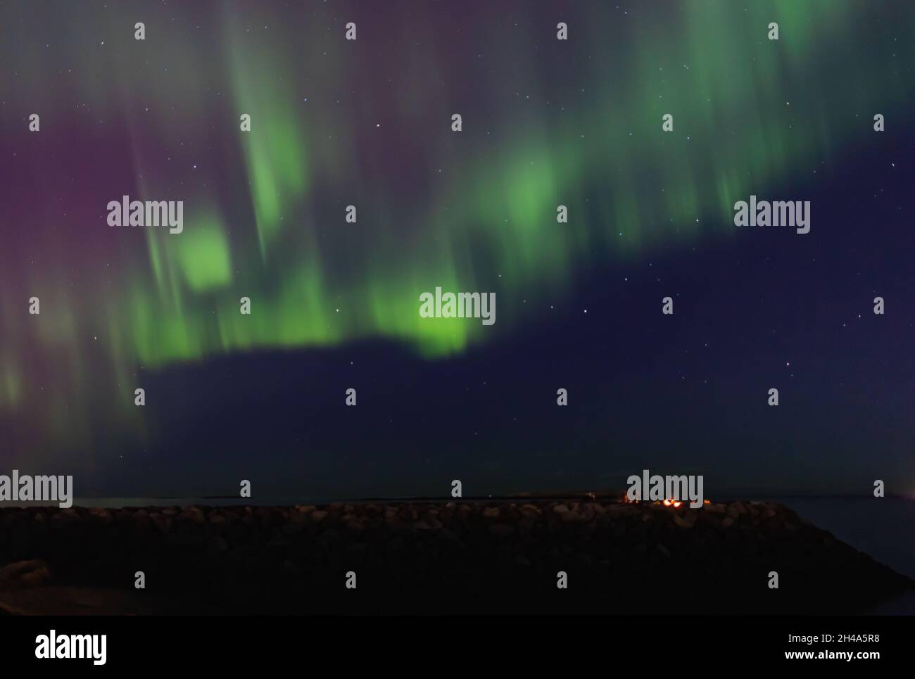 Aurora boreale su Reykjavík, Islanda Foto Stock
