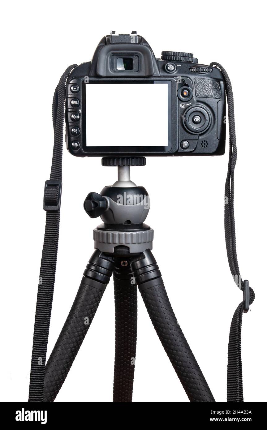 Moderna fotocamera reflex digitale su cavalletto isolato su sfondo bianco Foto Stock