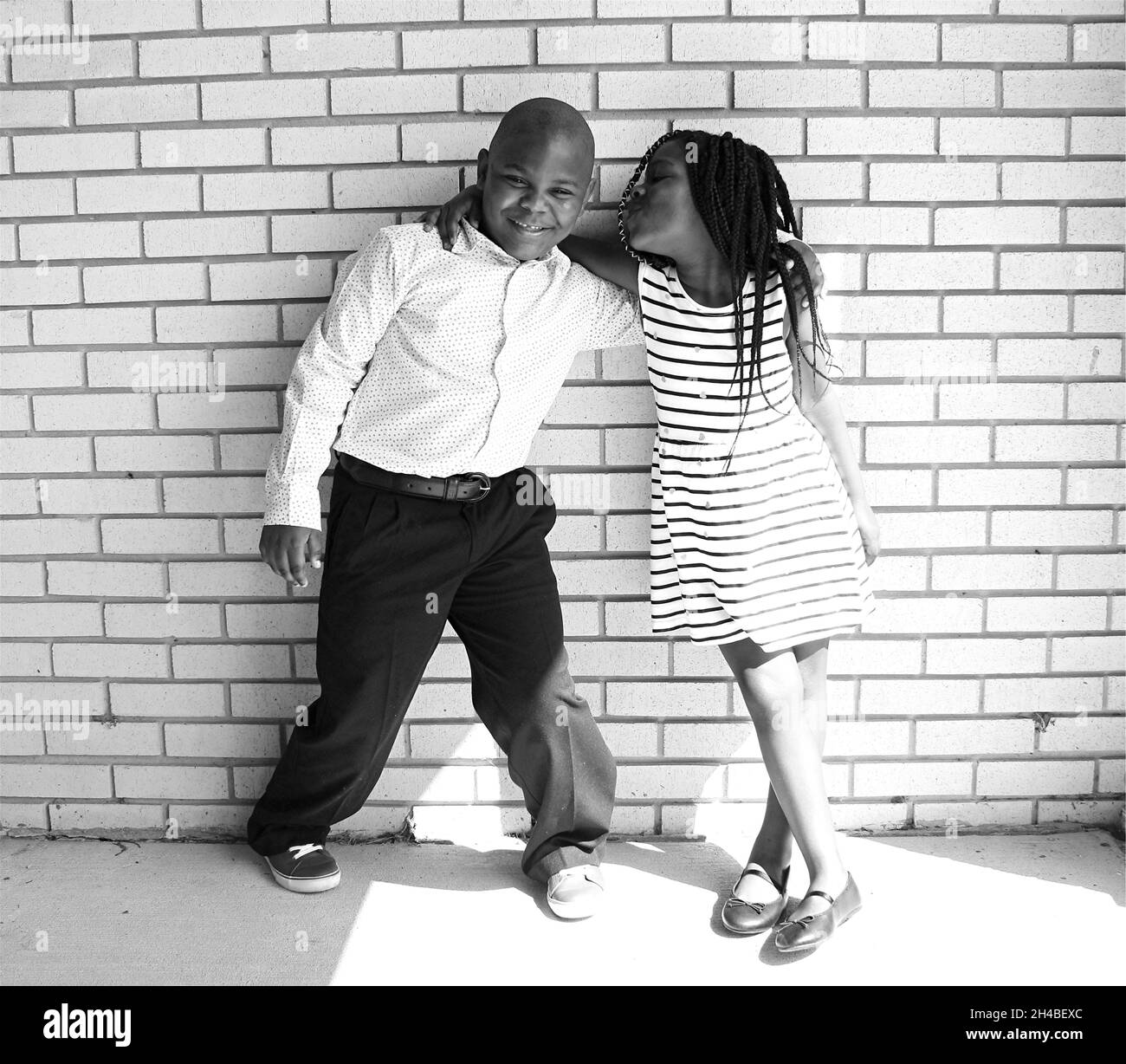 Fratelli e sorelle neri bambini. Foto Stock