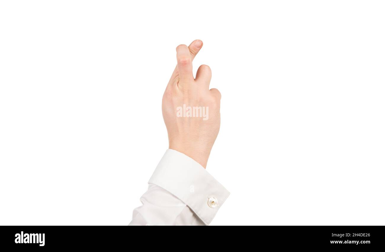 dita incrociate gesto di fare un desiderio con mano maschile isolato su bianco, false promesse Foto Stock