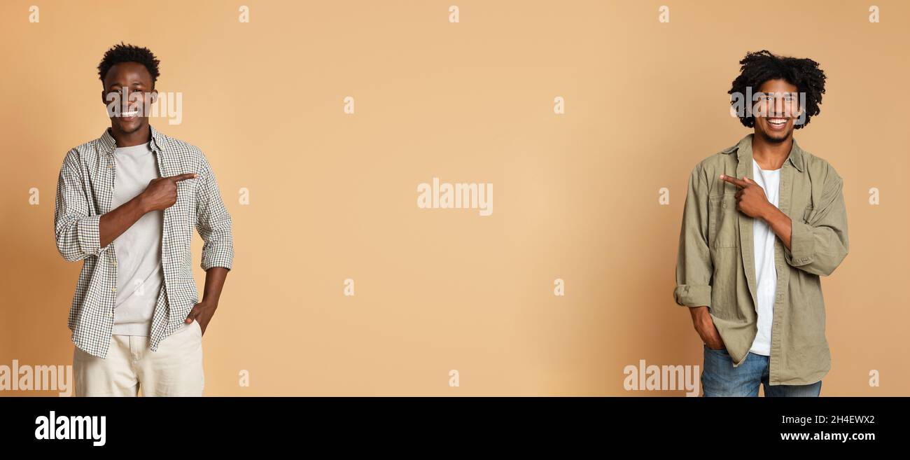 Controllare. Due allegri guys afroamericani puntano nel Medio Foto Stock