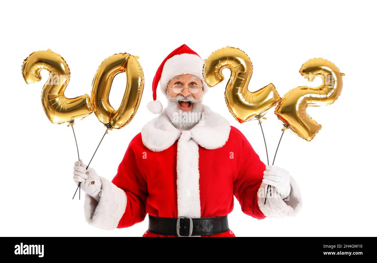 Babbo Natale con palloncini d'aria su sfondo bianco. Festa di Capodanno 2022 Foto Stock