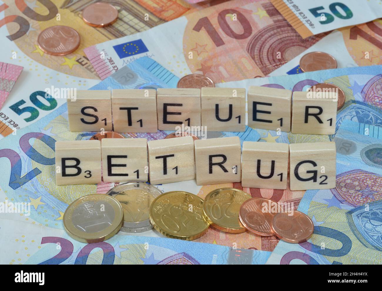 Foto simbolo frode fiscale Foto Stock