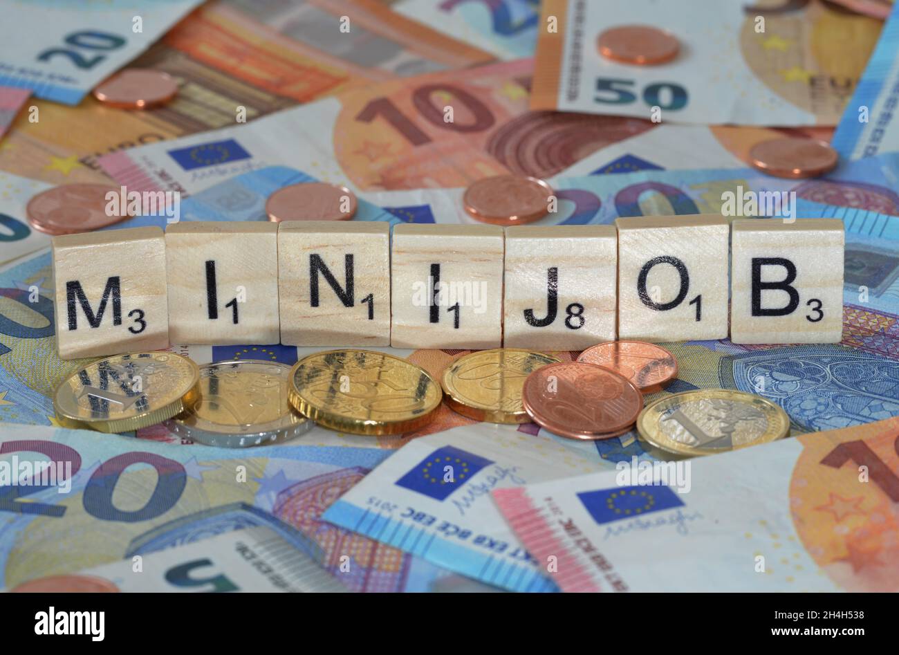 Foto simbolo termine economico mini-job Foto Stock