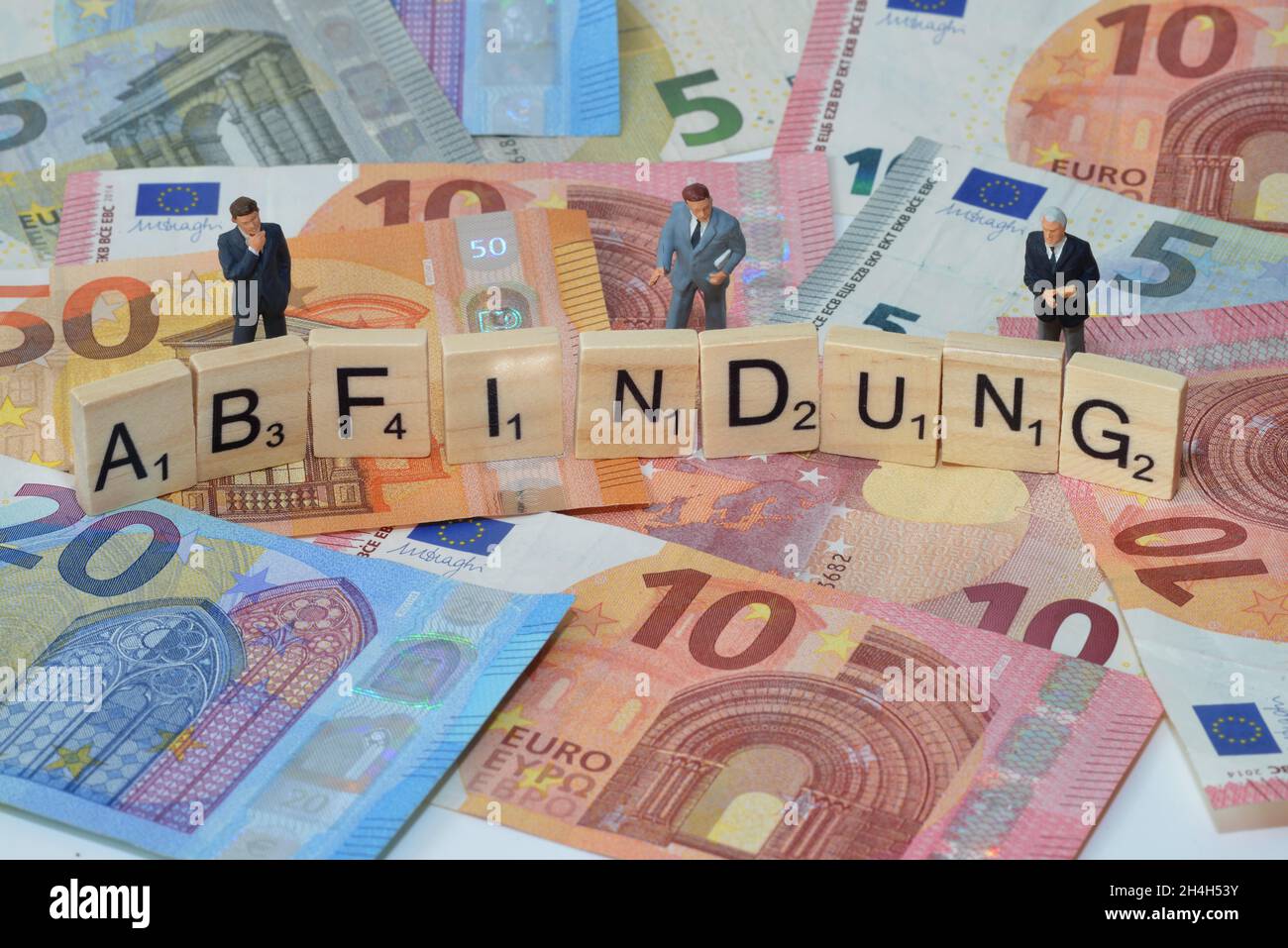 Foto simbolo termine economico indennità di licenziamento Foto Stock