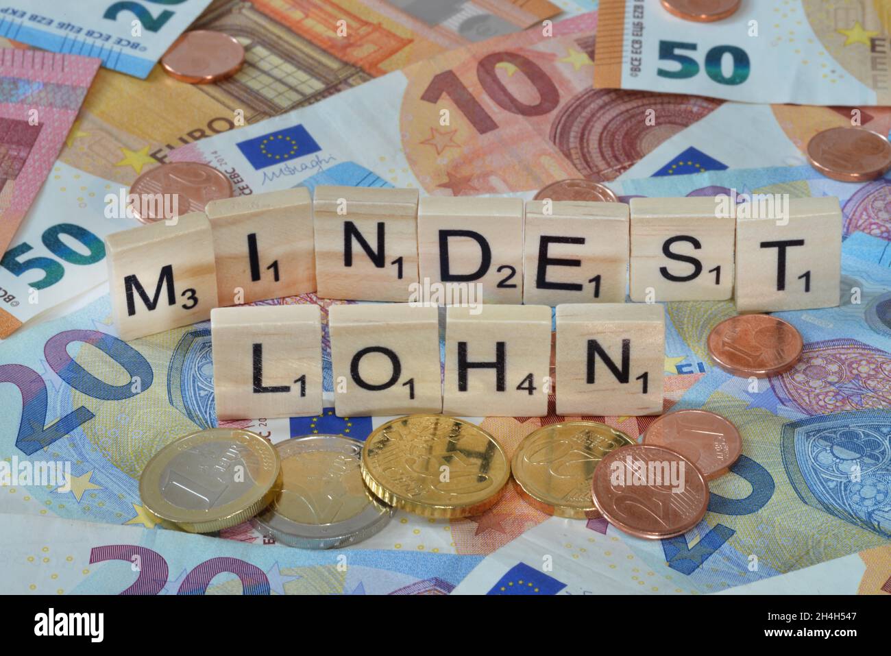 Simbolo foto termine economico salario minimo Foto Stock