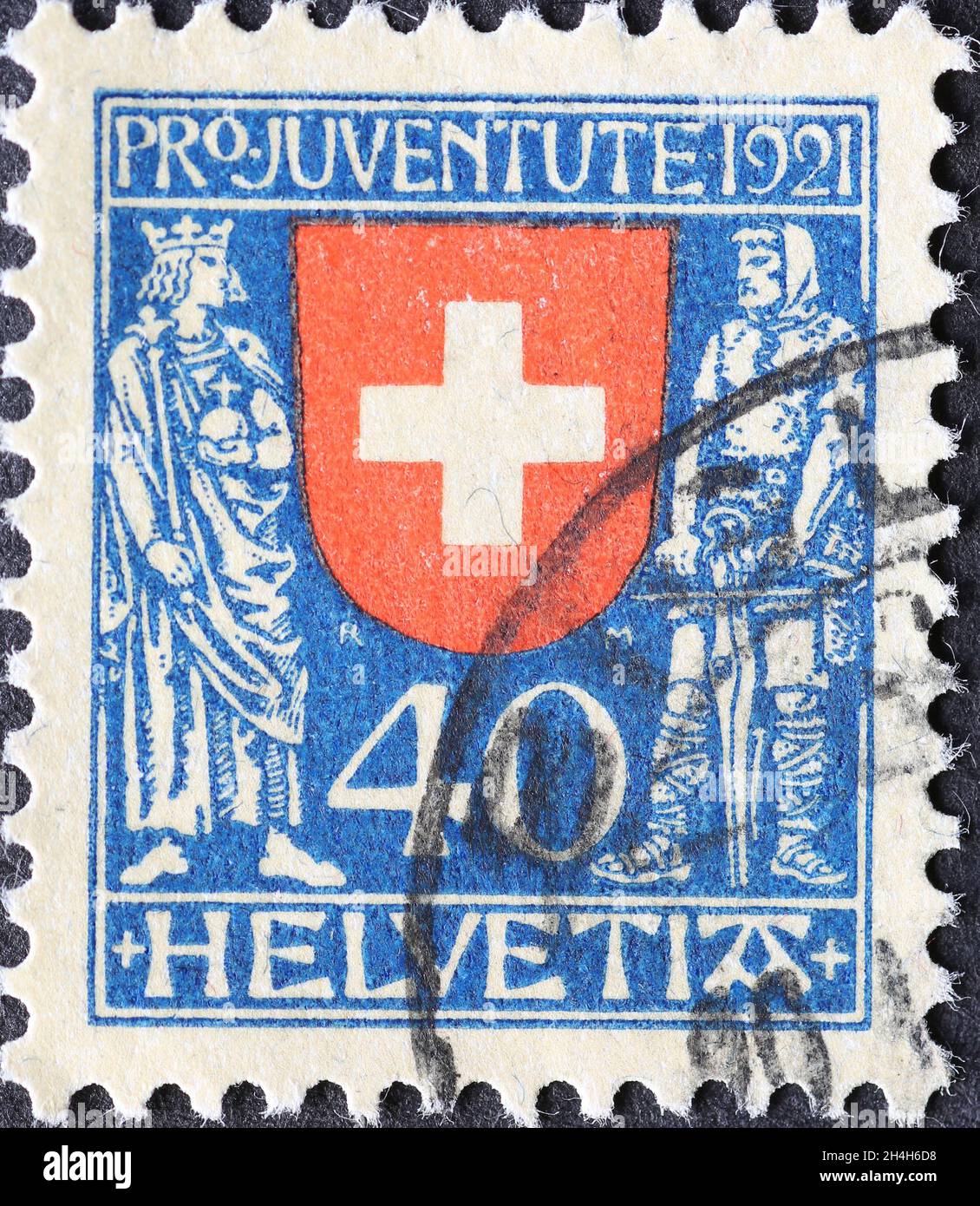 Svizzera - circa 1921: Francobollo stampato in Svizzera con l'imperatore e Guglielmo T, che raffigurava lo stemma storico della Svizzera Foto Stock