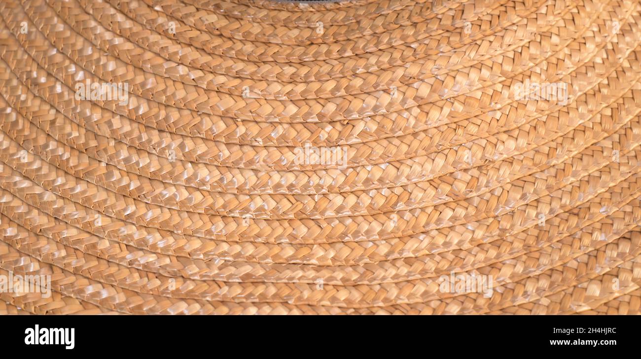 Sfondi vimini. Superficie del cappello intrecciato. Foto Stock
