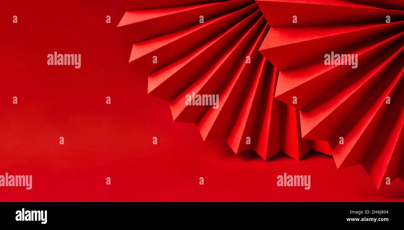 Sfondo minimalista in carta rossa. Foto Stock