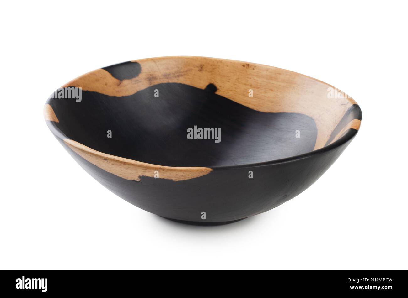 African legno nero ciotola vuoto isolato su uno sfondo bianco Foto Stock