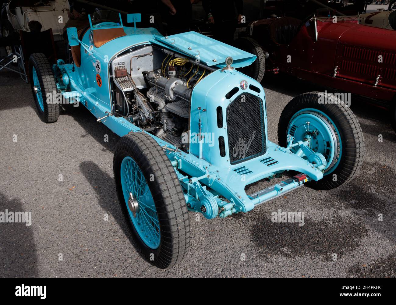 1933 Alfa Romeo BC 2300 Monza nel paddock garage pronto per la gara del Trofeo Earl Howe. Goodwood 7th Members Meeting, Sussex, Regno Unito. Foto Stock