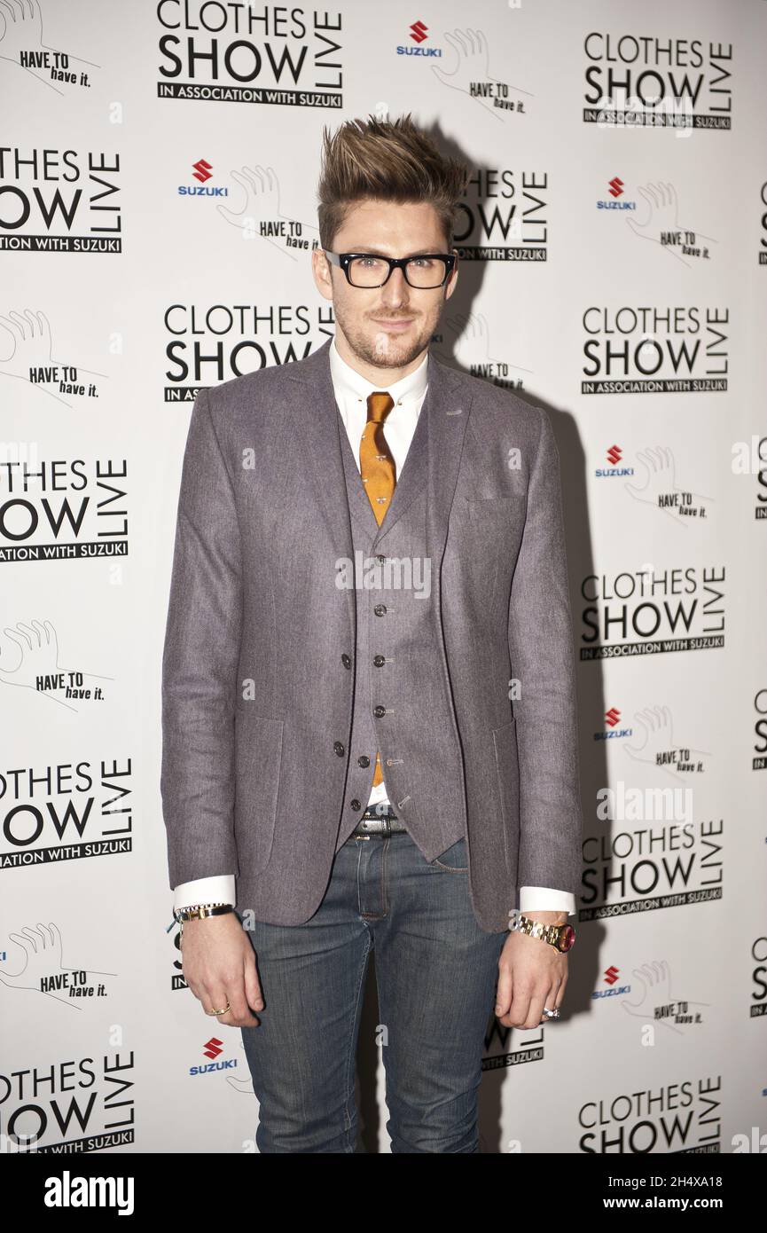 Henry Holland in posa per la stampa il giorno di apertura dei Clothes show Live 2012 - Birmingham Foto Stock