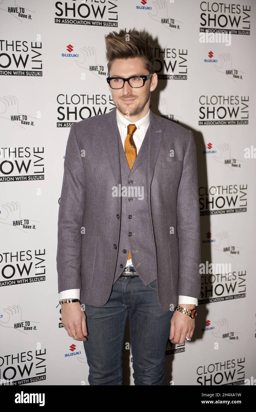 Henry Holland in posa per la stampa il giorno di apertura dei Clothes show Live 2012 - Birmingham Foto Stock