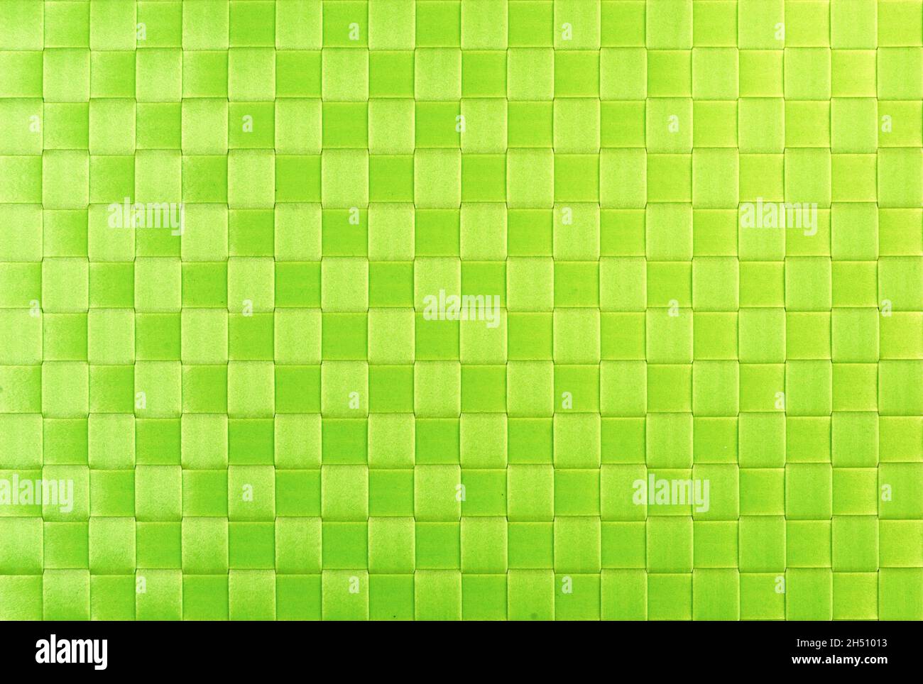 Sfondo dal nastro di vimini verde. Texture in vimini per design e decorazione. Foto Stock