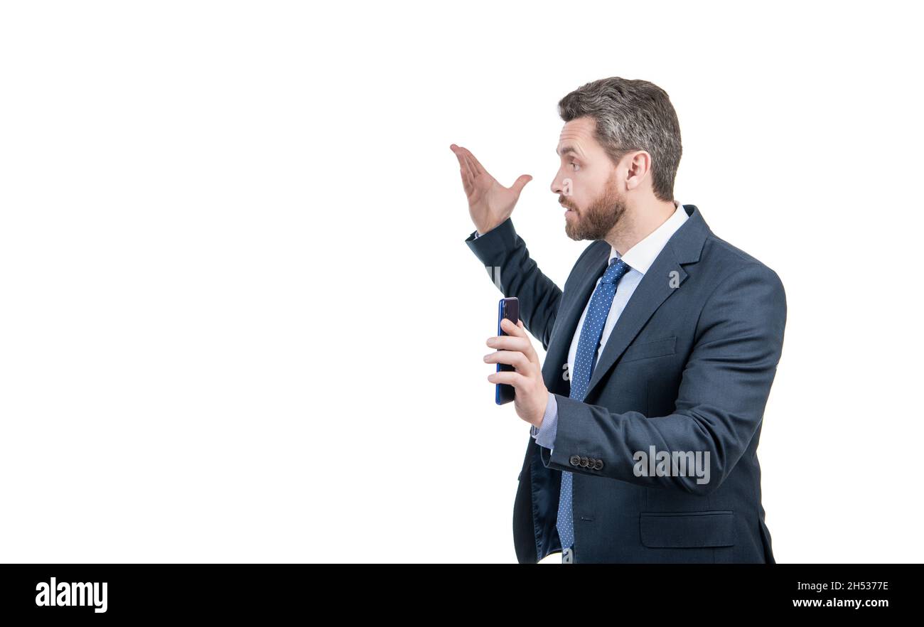 Non disturbarmi. Un uomo d'affari arrabbiato ha uno smartphone. Chiamata di lavoro. Chiamata mobile Foto Stock