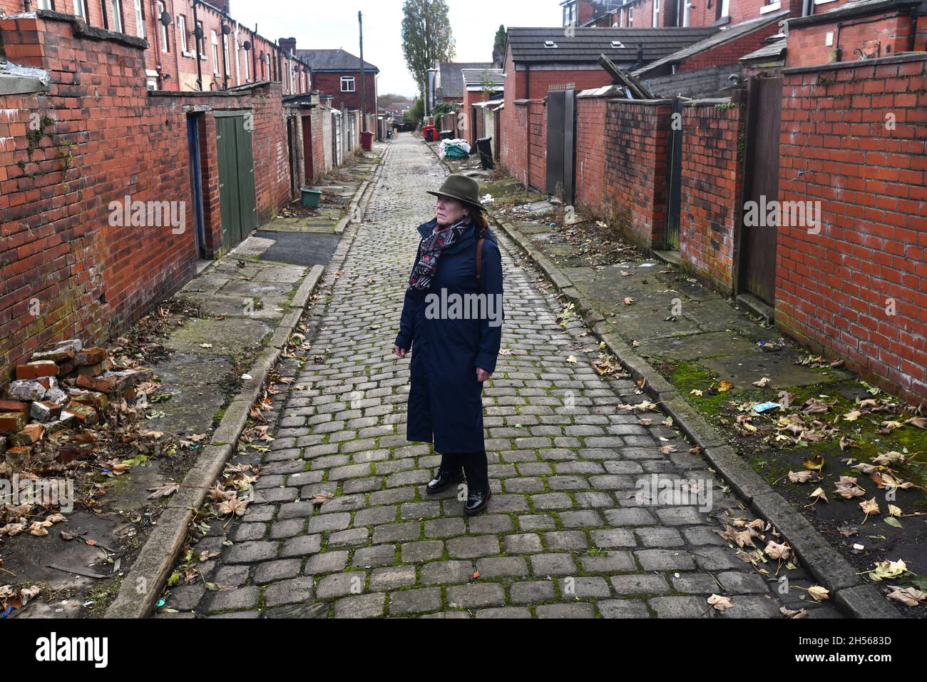 Back to back Housing with Ginnel or Alley Back Westbourne Avenue, Bolton, Lancashire Foto Stock