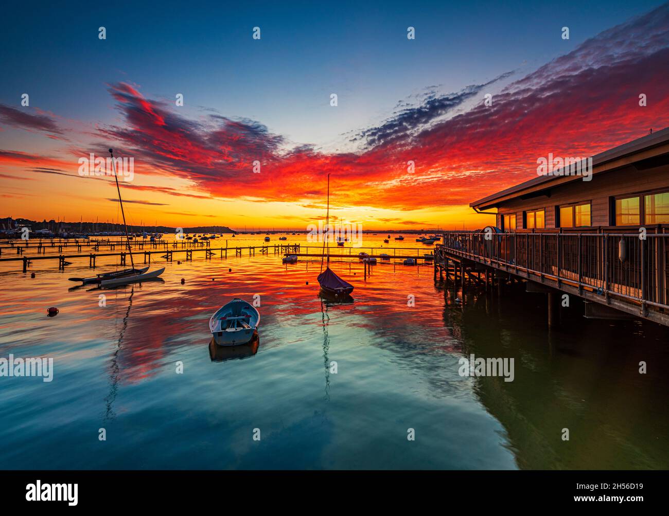 La vista da Sandbanks, Poole Harbour, è stato spesso considerato uno dei migliori posti nel Regno Unito per prendere il tramonto Foto Stock